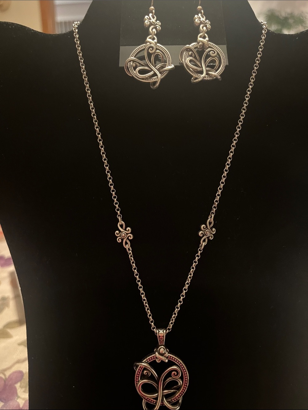 Silver-tone pendant necklace and matching earrings